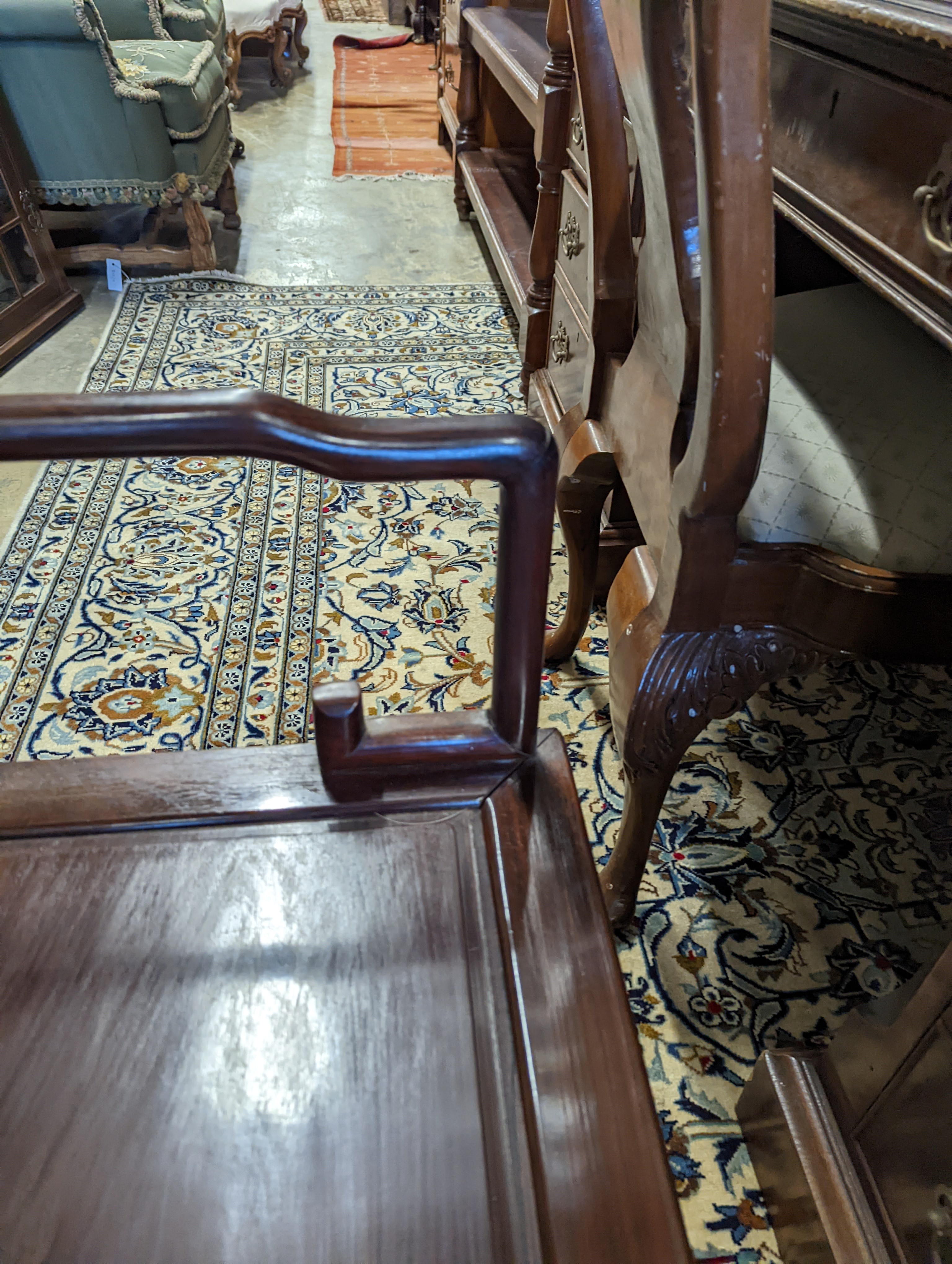 A pair of mid 20th century Chinese Hongmu elbow chairs with cushion seats, width 58cm, depth 49cm, height 92cm